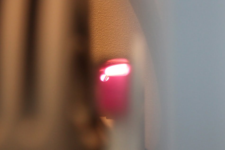 Tubo capilar coletor de amostra dentro do forno de grafite do espectrofotômetro