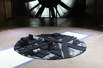 Três condições foram simuladas nos ensaios experimentais e nos computacionais. A primeira contemplou a situação atual da região, somente com os prédios existentes...