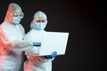 doctors wearing protective medical equipment with copy space